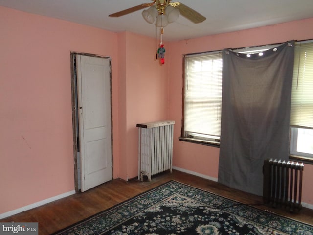 4636 Kraydor St, Philadelphia, PA 19136 - unfurnished room with radiator, ceiling fan, baseboards, and wood finished floors