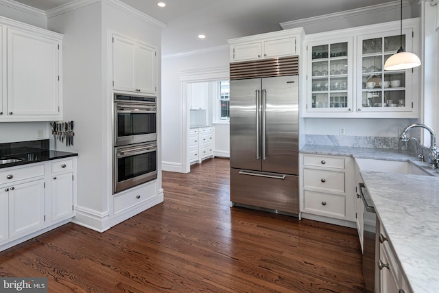 3 Evelyn Pl, Princeton, NJ 08540 - kitchen featuring appliances with stainless steel finishes, white cabinets, recessed lighting, crown molding, and dark wood finished floors