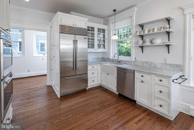 3 Evelyn Pl, Princeton, NJ 08540 - kitchen featuring appliances with stainless steel finishes, ornamental molding, white cabinets, dark wood-type flooring, and plenty of natural light