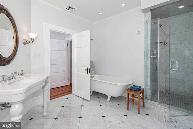 3 Evelyn Pl, Princeton, NJ 08540 - bathroom with ornamental molding, a shower stall, a freestanding tub, and recessed lighting