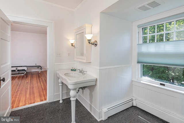 3 Evelyn Pl, Princeton, NJ 08540 - bathroom with a wainscoted wall, a baseboard heating unit, and ornamental molding