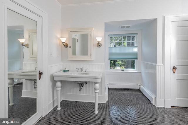 3 Evelyn Pl, Princeton, NJ 08540 - bathroom with wainscoting, a baseboard heating unit, crown molding, and tile patterned flooring
