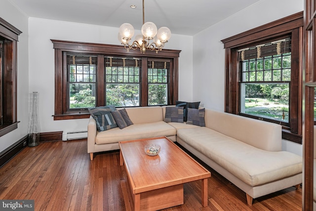 3 Evelyn Pl, Princeton, NJ 08540 - living room with healthy amount of natural light, a chandelier, dark wood-type flooring, a baseboard radiator, and crown molding
