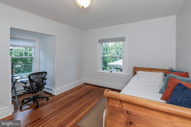 3 Evelyn Pl, Princeton, NJ 08540 - bedroom with baseboard heating, wood finished floors, ornamental molding, multiple windows, and an office area
