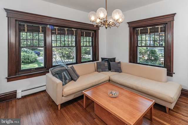3 Evelyn Pl, Princeton, NJ 08540 - living room with a baseboard heating unit, a chandelier, hardwood / wood-style floors, and crown molding