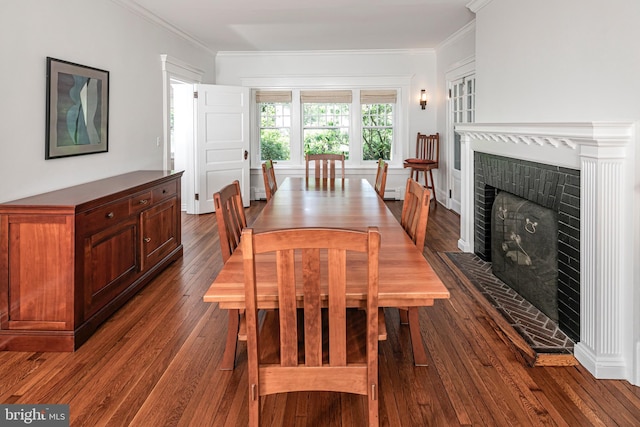 3 Evelyn Pl, Princeton, NJ 08540 - dining area with dark wood-style floors, a fireplace with raised hearth, and crown molding