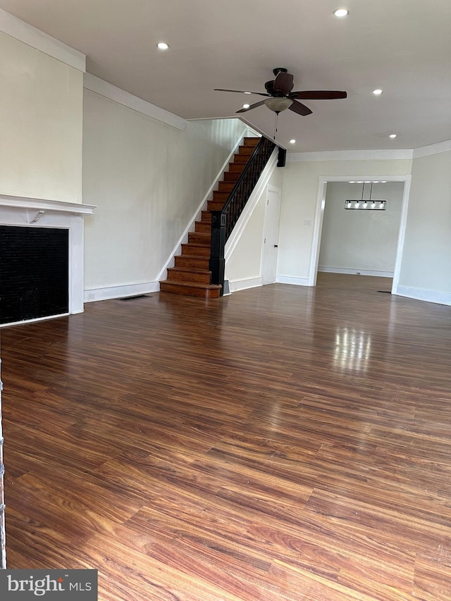 5235 Baltimore Ave, Philadelphia, PA 19143 - unfurnished living room featuring stairway, wood finished floors, ceiling fan, ornamental molding, and recessed lighting