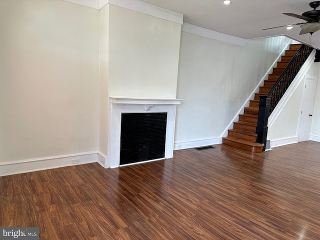 5235 Baltimore Ave, Philadelphia, PA 19143 - unfurnished living room featuring a fireplace, wood finished floors, ceiling fan, stairs, and recessed lighting