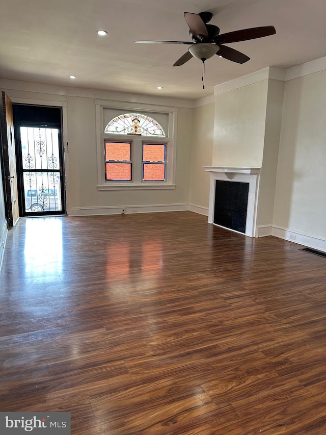 5235 Baltimore Ave, Philadelphia, PA 19143 - unfurnished living room featuring a fireplace, wood finished floors, a ceiling fan, recessed lighting, and baseboards
