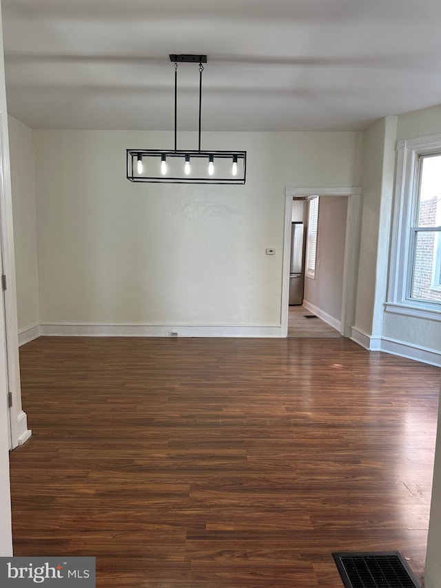 5235 Baltimore Ave, Philadelphia, PA 19143 - unfurnished dining area with wood finished floors and baseboards