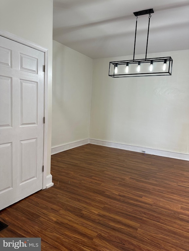 5235 Baltimore Ave, Philadelphia, PA 19143 - unfurnished dining area with baseboards and wood finished floors