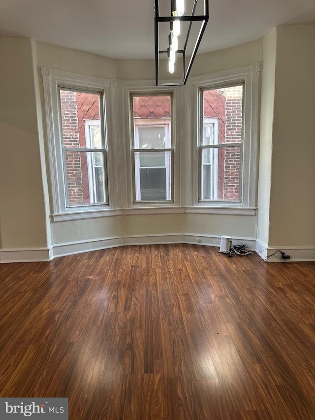 5235 Baltimore Ave, Philadelphia, PA 19143 - unfurnished dining area featuring baseboards and wood finished floors
