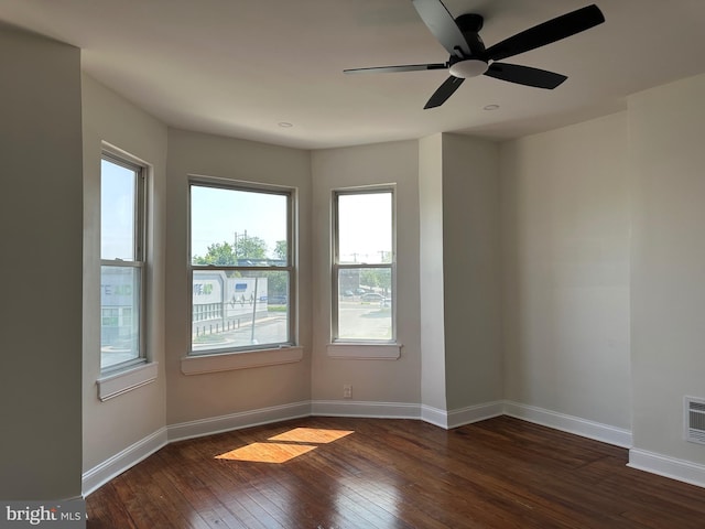 5235 Baltimore Ave, Philadelphia, PA 19143 - spare room featuring dark wood-style flooring, baseboards, and a ceiling fan