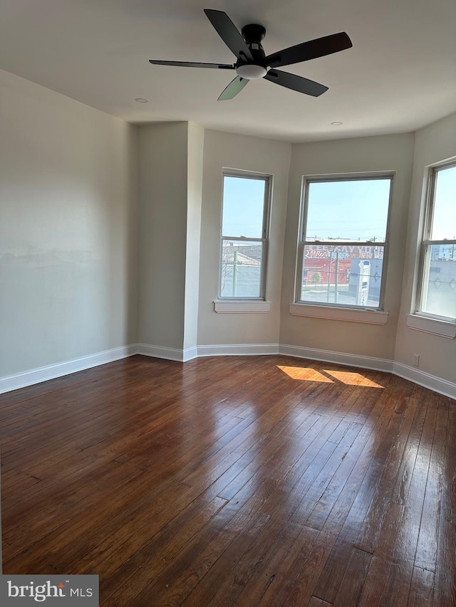 5235 Baltimore Ave, Philadelphia, PA 19143 - spare room with dark wood finished floors, baseboards, and ceiling fan