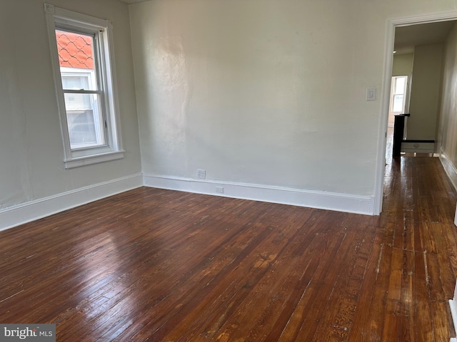 5235 Baltimore Ave, Philadelphia, PA 19143 - empty room featuring dark wood finished floors and baseboards