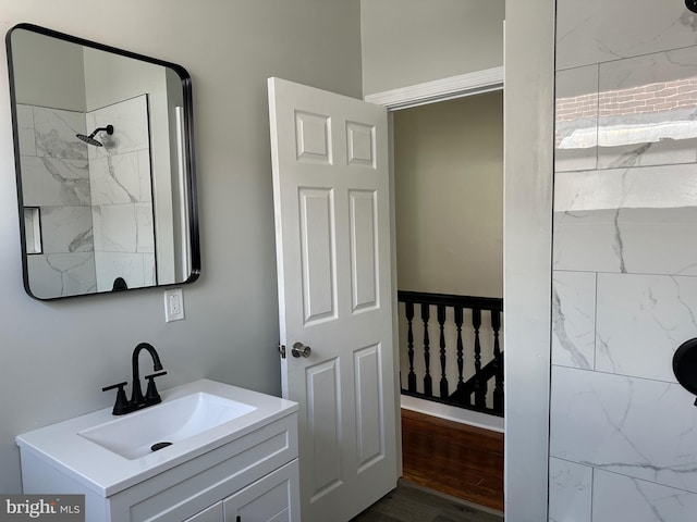 5235 Baltimore Ave, Philadelphia, PA 19143 - full bathroom featuring vanity, wood finished floors, and a shower