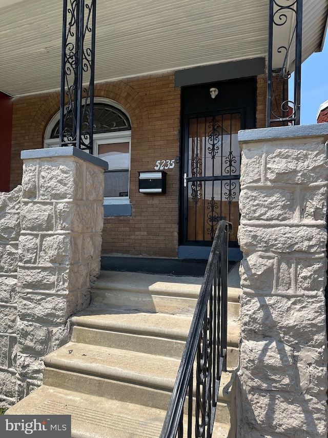 5235 Baltimore Ave, Philadelphia, PA 19143 - view of exterior entry featuring brick siding