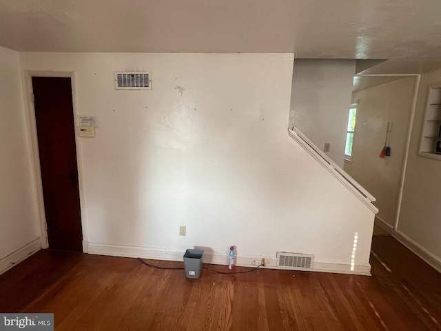 1969 Victory Dr, Baltimore, MD 21227 - unfurnished living room with wood finished floors and baseboards