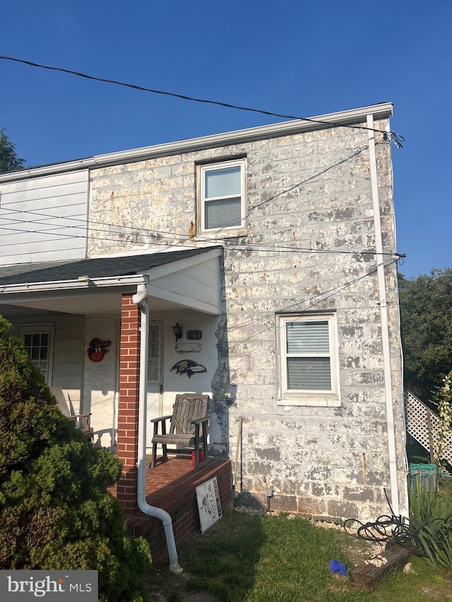1969 Victory Dr, Baltimore, MD 21227 - view of side of property featuring covered porch