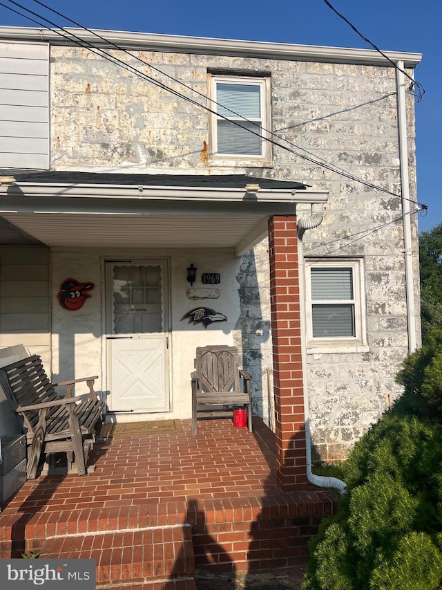 1969 Victory Dr, Baltimore, MD 21227 - view of exterior entry featuring a porch