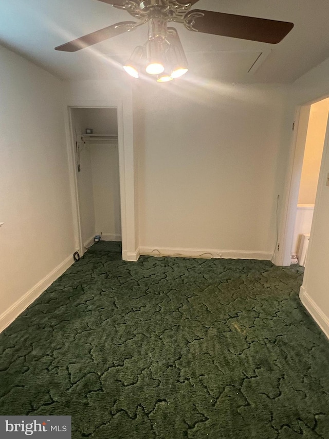 1969 Victory Dr, Baltimore, MD 21227 - unfurnished bedroom featuring dark carpet and baseboards