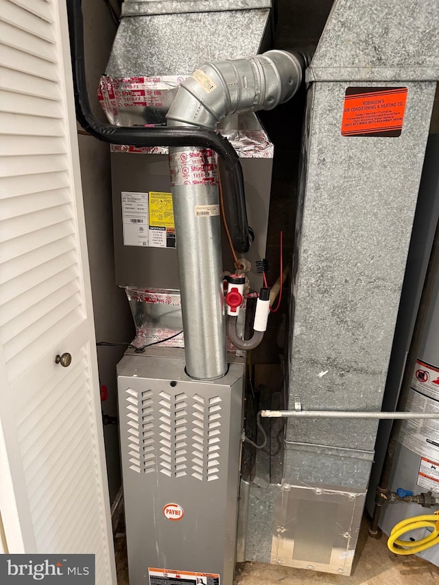 5147 Dudley Ln Unit 44, Bethesda, MD 20814 - utility room featuring gas water heater and heating unit
