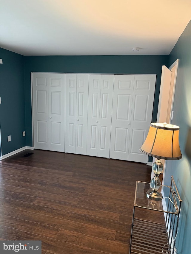 5147 Dudley Ln Unit 44, Bethesda, MD 20814 - bedroom with dark wood finished floors and a closet
