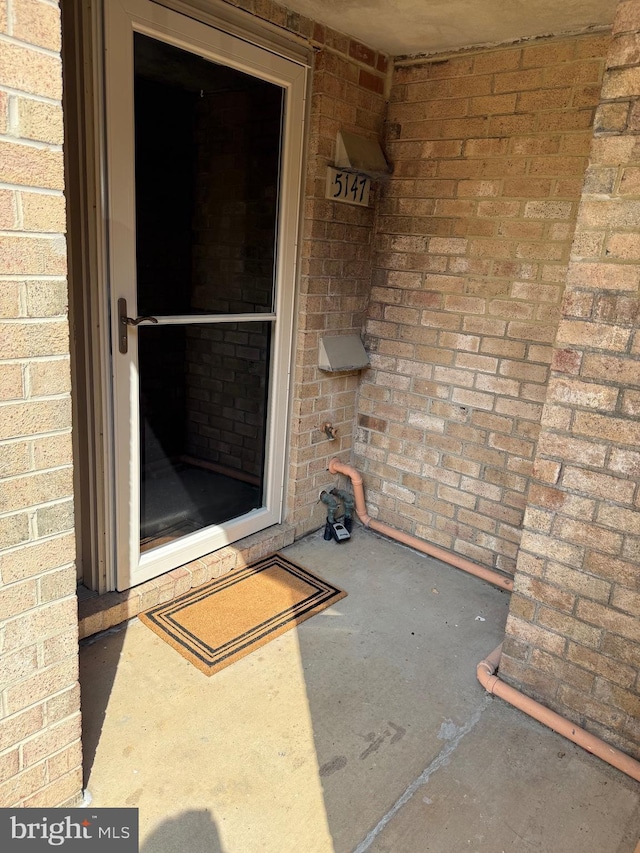 5147 Dudley Ln Unit 44, Bethesda, MD 20814 - property entrance featuring brick siding