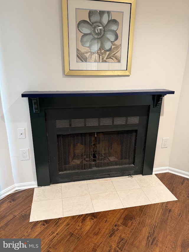 5147 Dudley Ln Unit 44, Bethesda, MD 20814 - detailed view of a fireplace and wood finished floors