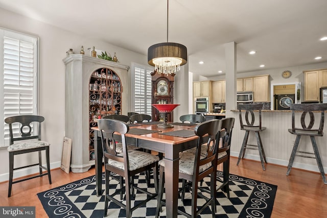 11742 Maid At Arms Ln, Berlin, MD 21811 - dining space with washer / dryer, light wood-type flooring, baseboards, and recessed lighting