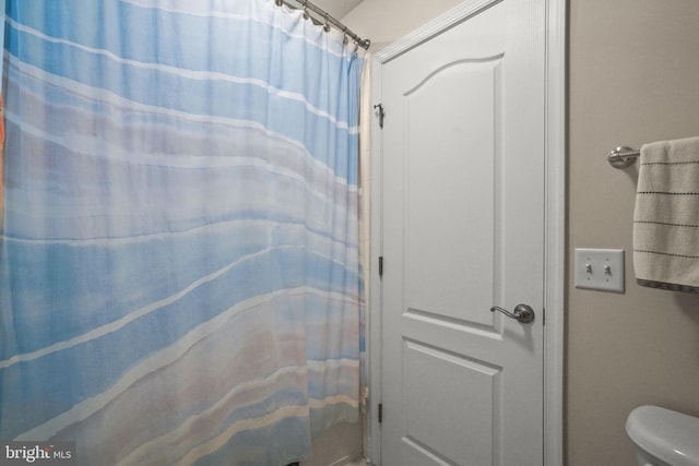 11742 Maid At Arms Ln, Berlin, MD 21811 - full bath featuring toilet and a shower with shower curtain