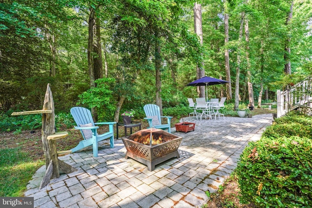 11742 Maid At Arms Ln, Berlin, MD 21811 - view of patio with an outdoor fire pit and outdoor dining space