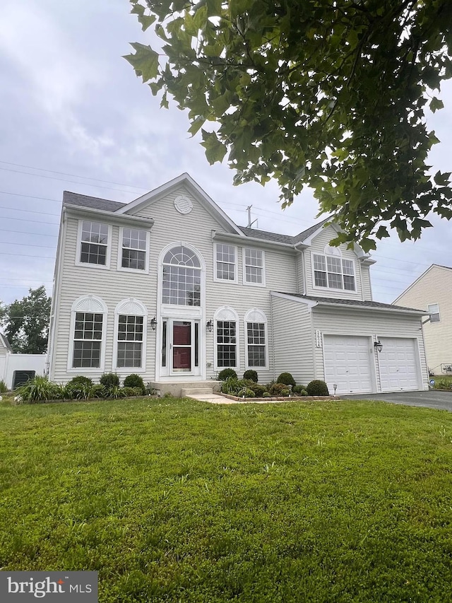 1624 Osprey Cir, Cambridge, MD 21613 - colonial inspired home featuring driveway, a front yard, and a garage