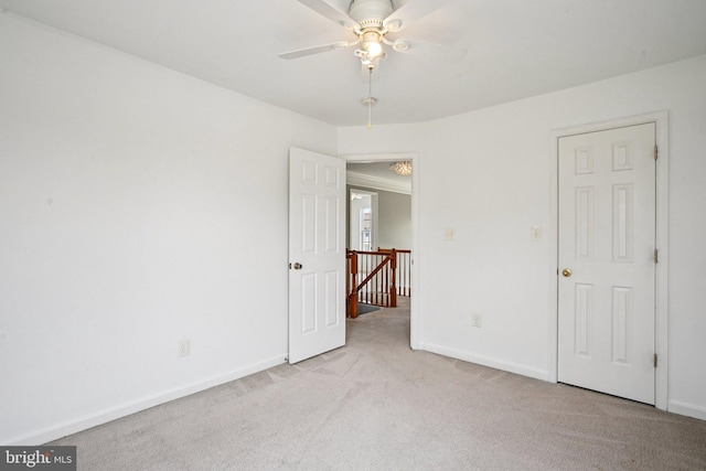 1624 Osprey Cir, Cambridge, MD 21613 - unfurnished bedroom featuring light carpet and baseboards