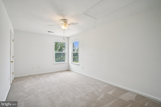 1624 Osprey Cir, Cambridge, MD 21613 - carpeted spare room with attic access and a ceiling fan