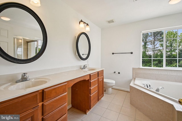 1624 Osprey Cir, Cambridge, MD 21613 - full bathroom with tile patterned flooring, double vanity, a garden tub, and a shower stall