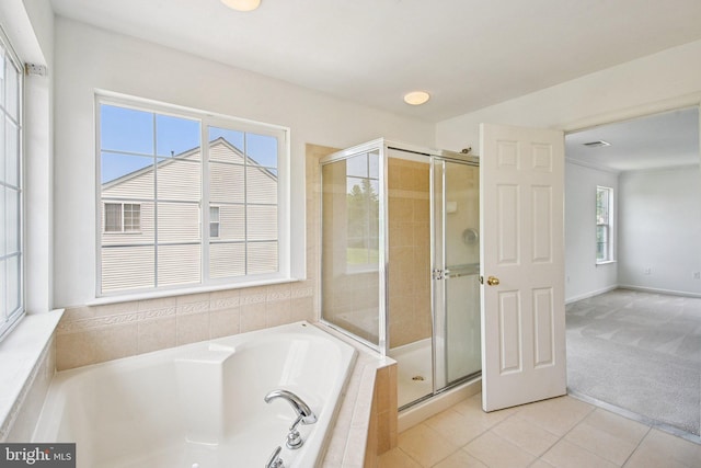 1624 Osprey Cir, Cambridge, MD 21613 - full bathroom featuring a garden tub, a stall shower, and tile patterned flooring