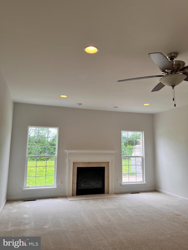 1624 Osprey Cir, Cambridge, MD 21613 - unfurnished living room with carpet, a fireplace with flush hearth, recessed lighting, and a ceiling fan