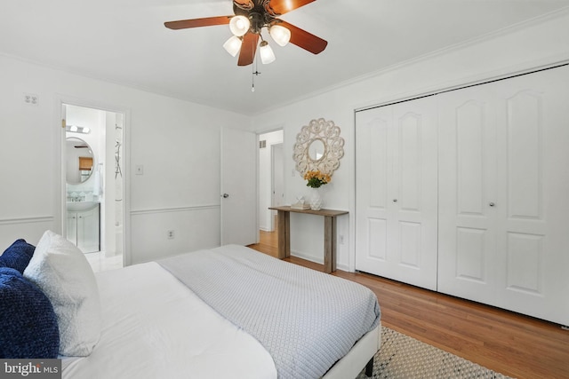8408 Conover Pl, Alexandria, VA 22308 - bedroom featuring wood finished floors, a closet, ensuite bath, ceiling fan, and ornamental molding