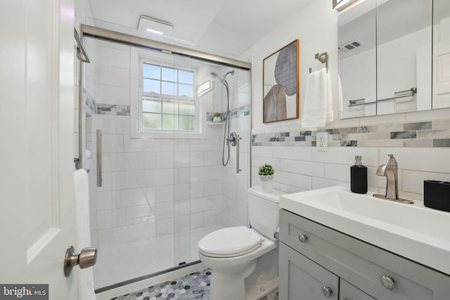 8408 Conover Pl, Alexandria, VA 22308 - full bath featuring vanity, a stall shower, tile walls, and backsplash
