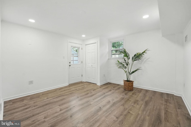 8408 Conover Pl, Alexandria, VA 22308 - entrance foyer with healthy amount of natural light, wood finished floors, and recessed lighting