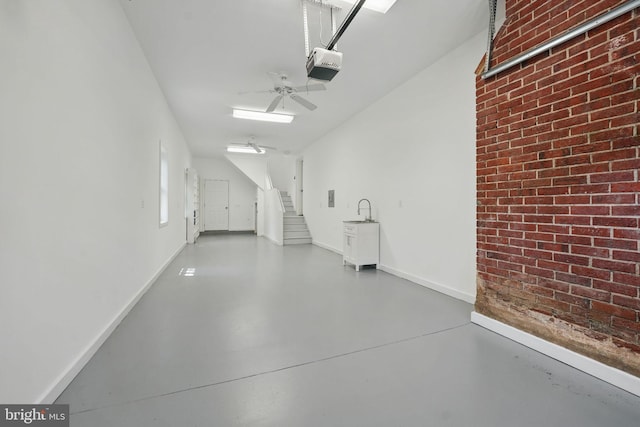 8408 Conover Pl, Alexandria, VA 22308 - garage featuring a garage door opener and ceiling fan