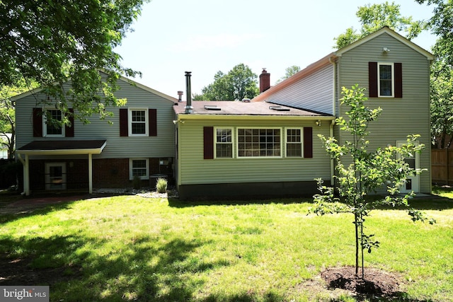 8408 Conover Pl, Alexandria, VA 22308 - rear view of property featuring a yard and a chimney