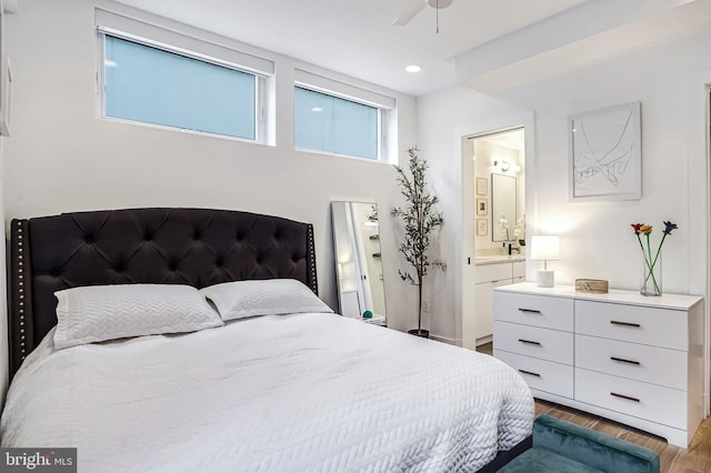 3514 13th St NW Unit 1, Washington, DC 20010 - bedroom with wood finished floors, connected bathroom, and recessed lighting