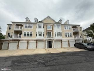 1509 Feral Dae Ln Unit 102, Annapolis, MD 21409 - view of property with a garage and driveway