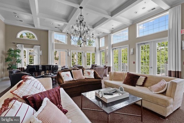 1509 Feral Dae Ln Unit 102, Annapolis, MD 21409 - living area featuring a towering ceiling, healthy amount of natural light, a chandelier, beam ceiling, and coffered ceiling