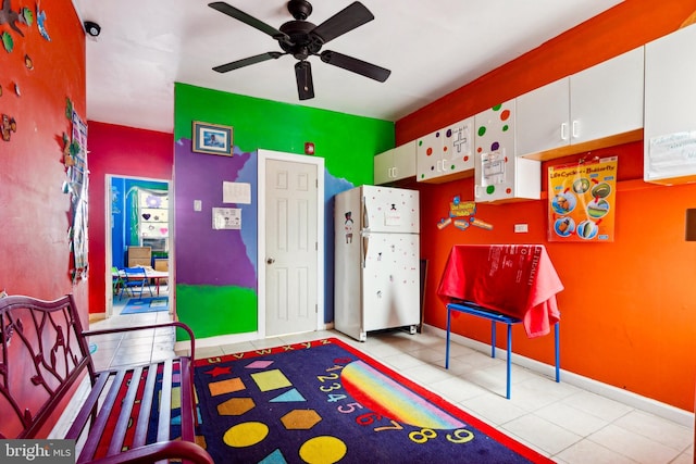 7221 W Passyunk Ave, Philadelphia, PA 19142 - playroom featuring a ceiling fan, baseboards, and tile patterned floors