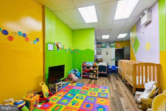 7221 W Passyunk Ave, Philadelphia, PA 19142 - playroom with a paneled ceiling and wood finished floors