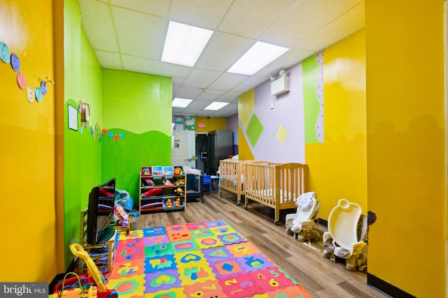 7221 W Passyunk Ave, Philadelphia, PA 19142 - recreation room with wood finished floors and a paneled ceiling