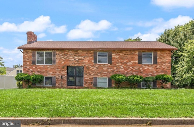 1003 Cedar Park Rd, Annapolis, MD 21401 - raised ranch with a chimney and brick siding